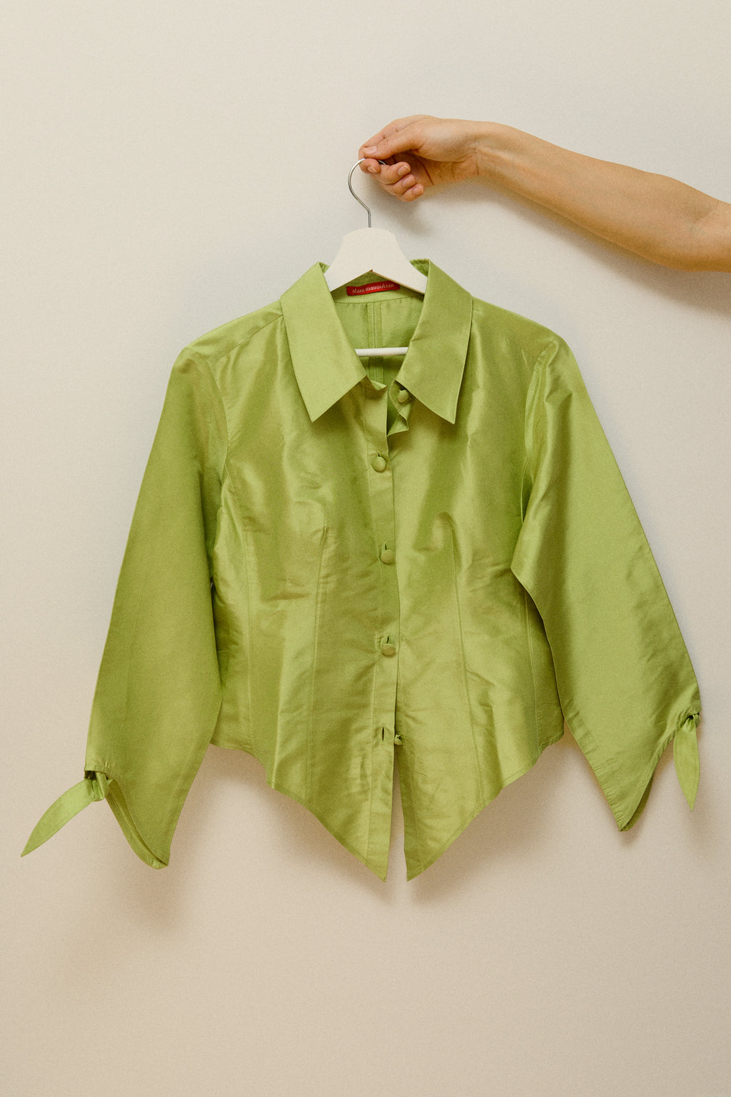 Bright green silk blouse